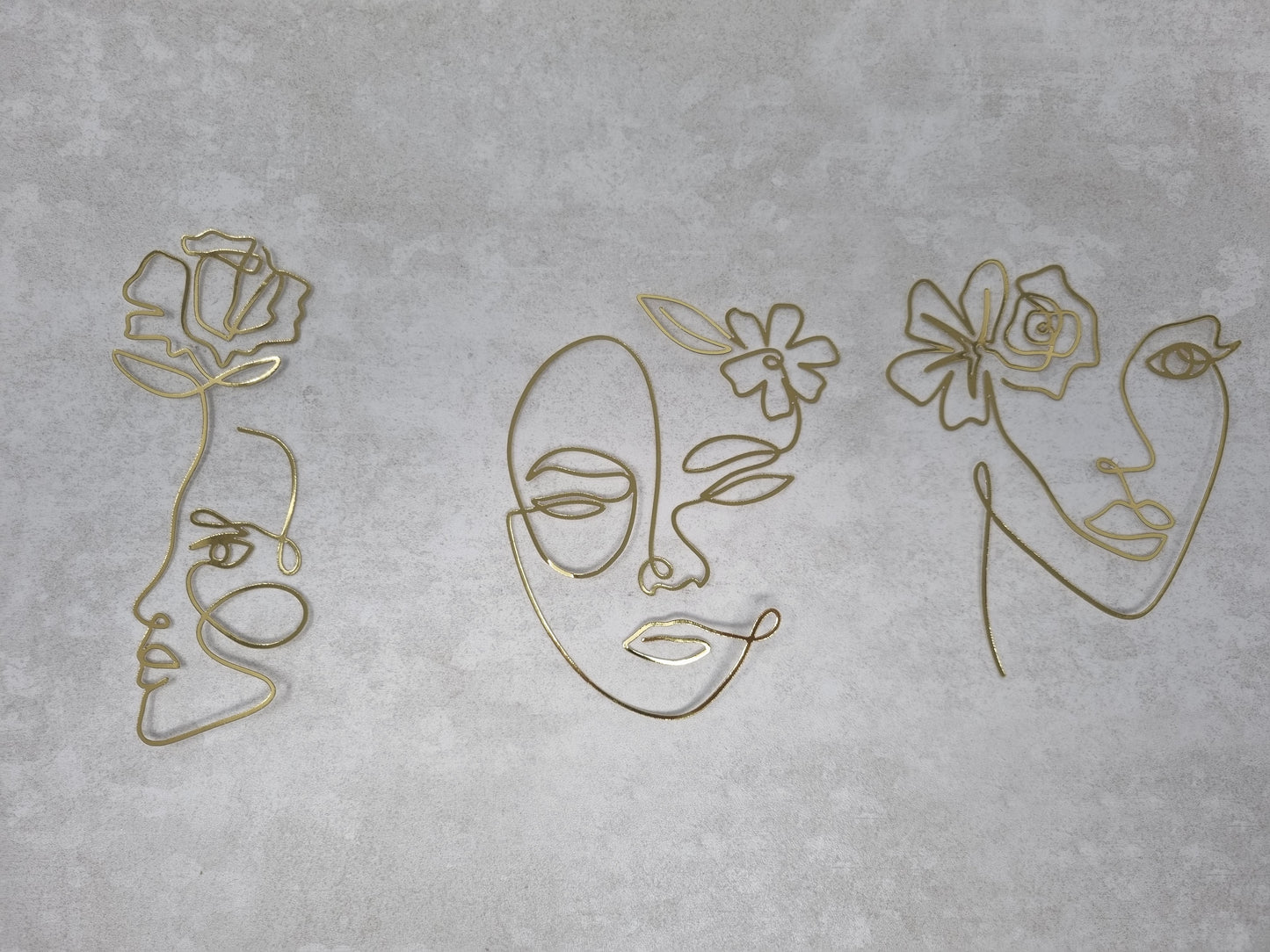 Floral face continuous line art charm